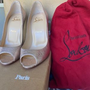 Christian Louboutin peep toed pumps